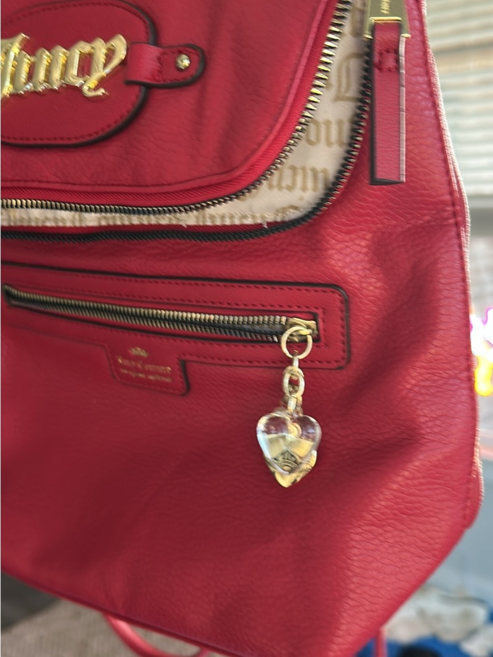 Juicy Couture Red Leather Backpack with Gold Hardware and Heart Charm
